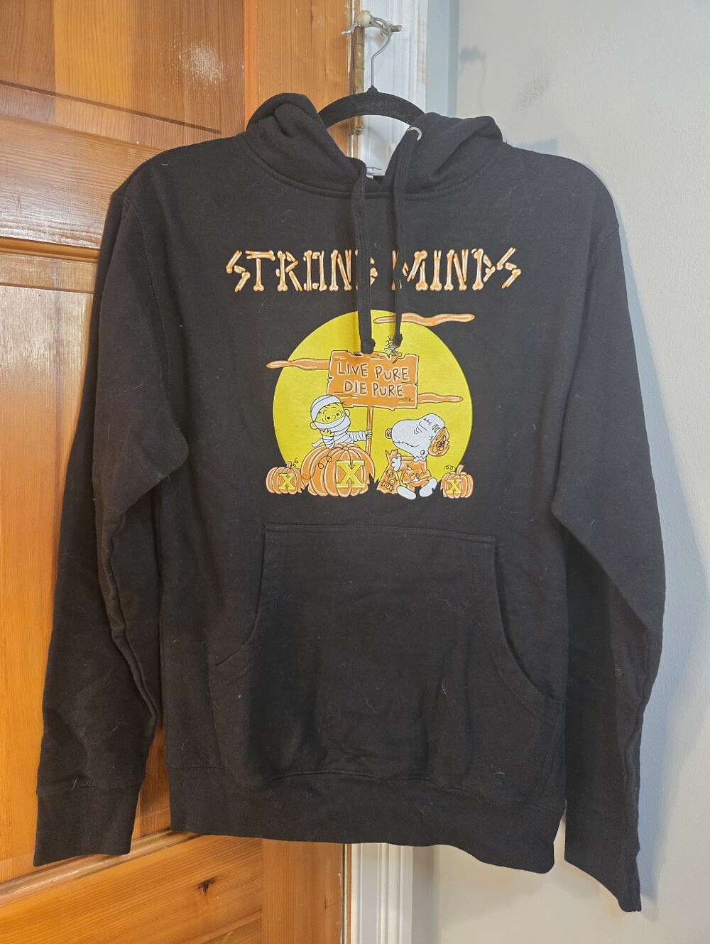 Strong Minds Black Graphic Pullover Hoodie - Halloween Peanuts Design